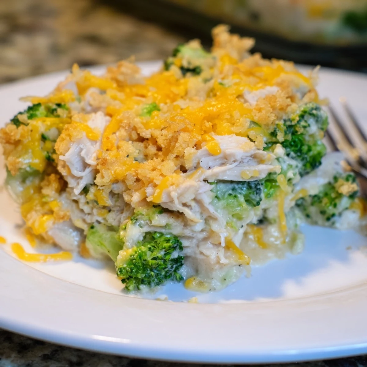 A comforting Chicken & Broccoli Cheddar Bake perfect for cozy family dinners.  