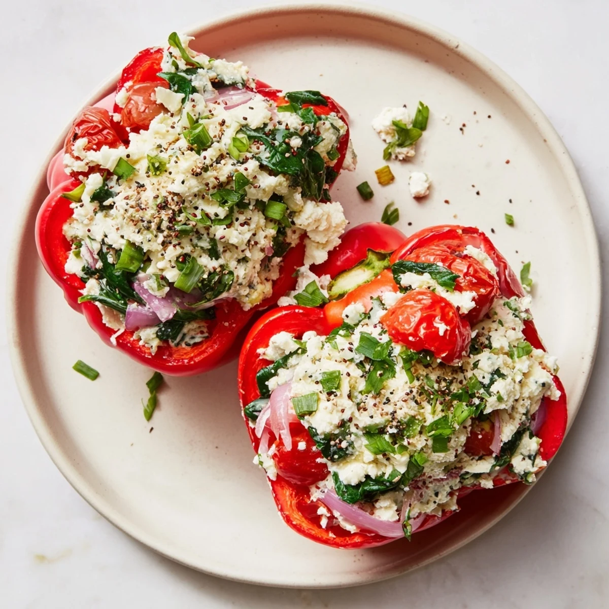 Cottage Cheese Stuffed Bell Peppers topped with everything bagel seasoning offer a delightful mix of textures.