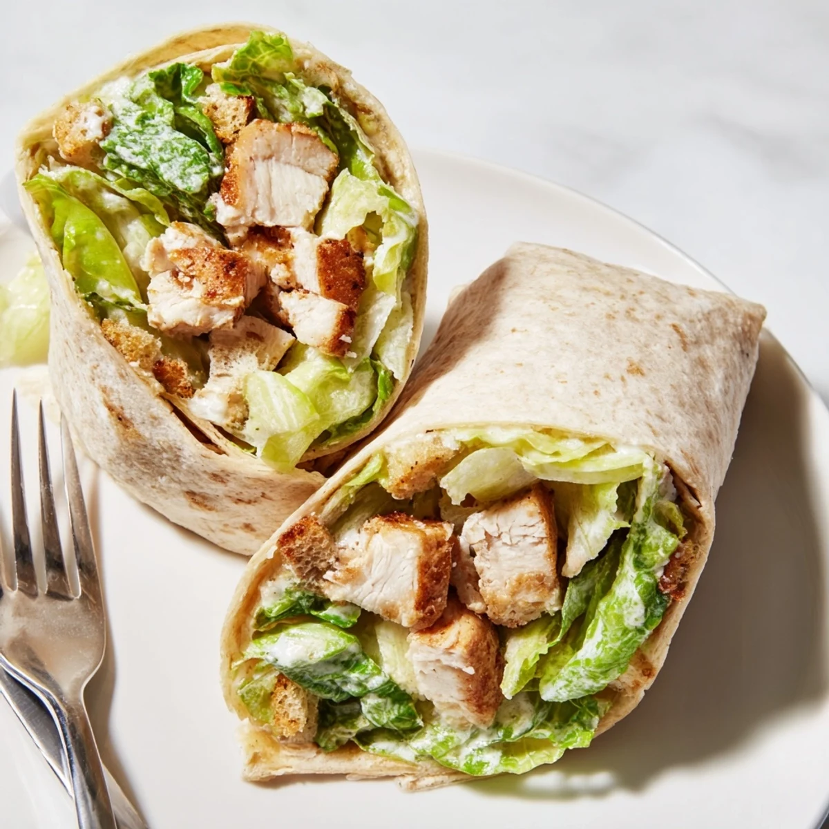 Ready-to-eat chicken Caesar wraps, a quick and easy American recipe bursting with flavor and texture.