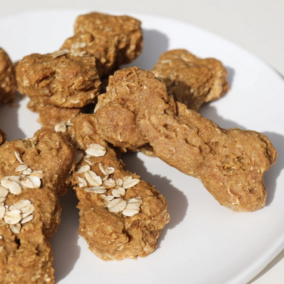 Golden-brown Pawsitively Good Dog Bone Treats, fresh from the oven, ready to become a tasty reward.