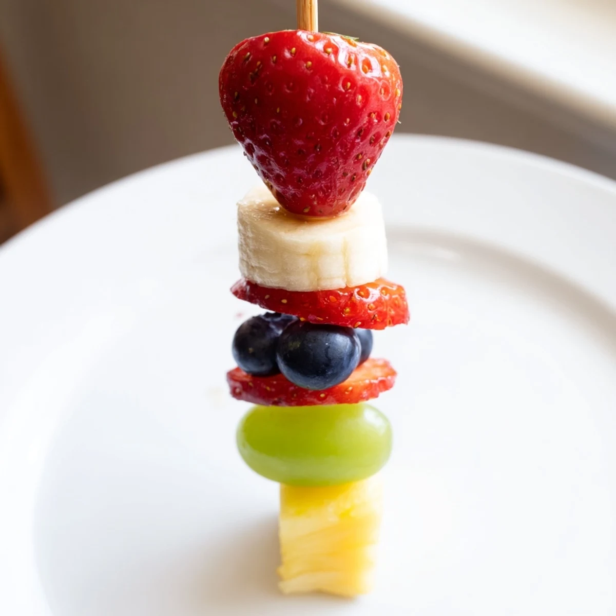 These easy Rocket Ship Fruit Skewers are a kid-friendly treat, bursting with the natural sweetness of summer fruits.