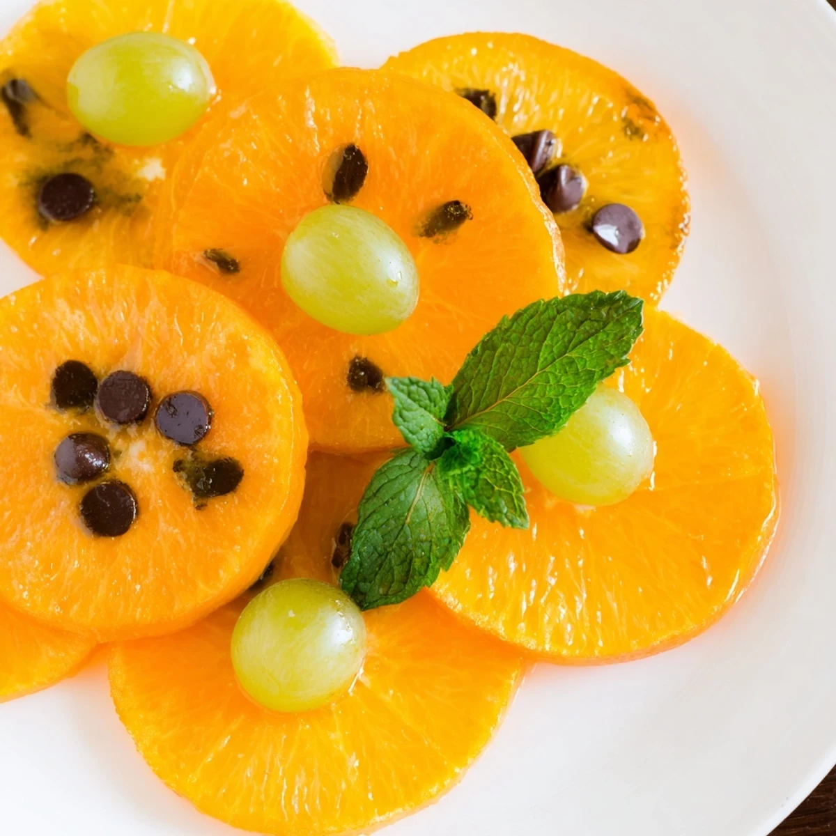 Festive Pumpkin Patch Orange Slices, a vibrant and healthy Halloween dessert platter for kids.