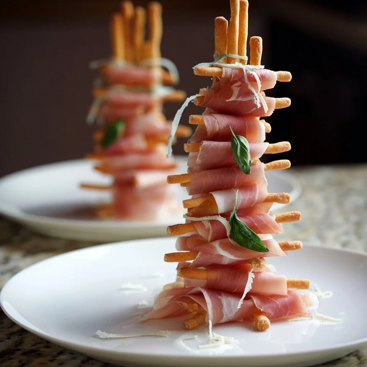 Golden Gate appetizer: Crispy breadsticks act as towers with prosciutto draped, a savory, quick party snack.