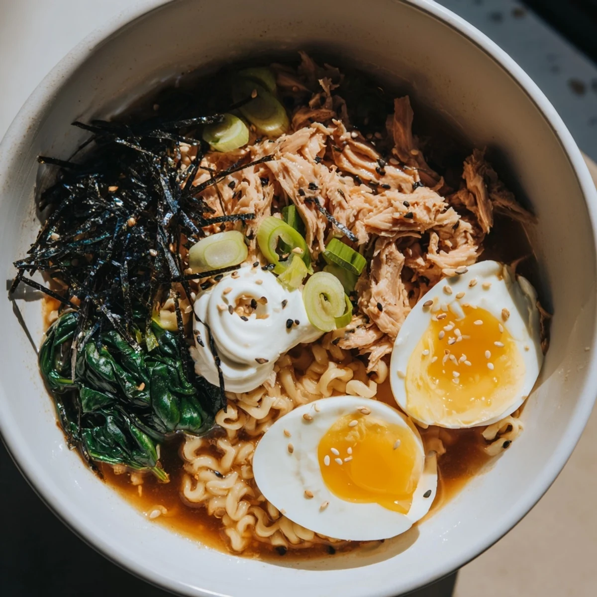 Creamy dollops of Kewpie mayonnaise swirl into savory Chicken Ramen for a rich and comforting meal.