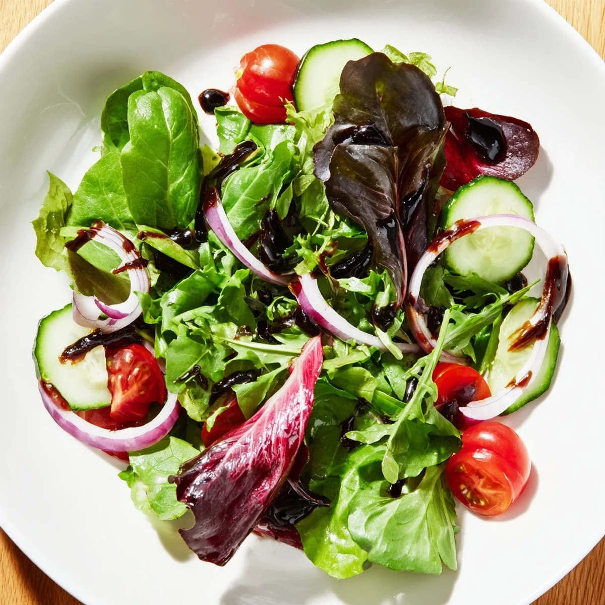 This Quick Balsamic Vinegar Salad features a lovely combination of colorful vegetables drizzled with a rich balsamic glaze.