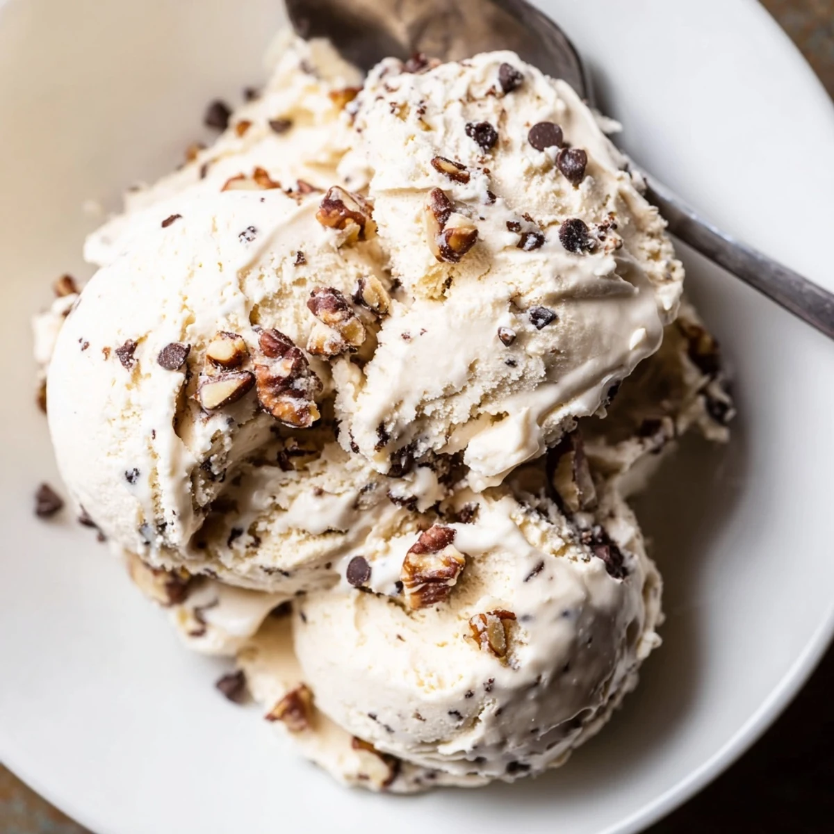 A close-up of creamy cottage cheese ice cream, ready to scoop and enjoy.