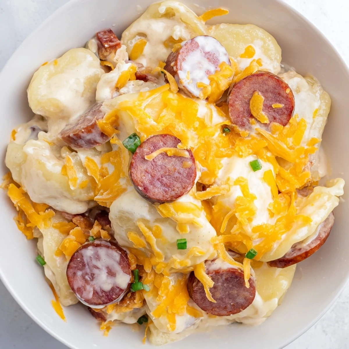 A hearty Crockpot Pierogi Casserole With Kielbasa offers a comforting, cheesy main dish for dinner.