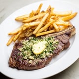 Perfectly seared steaks topped with rich garlic herb butter and fresh parsley.  
