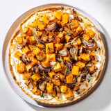 Golden-crusted maple leaf-shaped Feuilles d'Érable Tartes Salées d'Automne, filled with roasted vegetables.