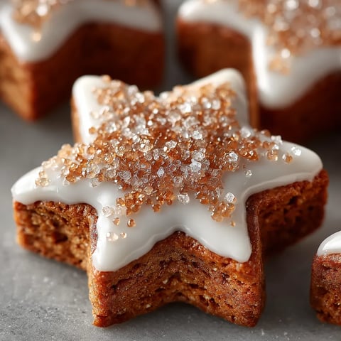 A close up of a cookie with sugar sprinkled on top.