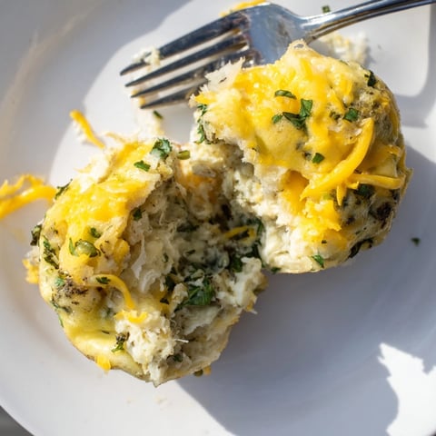 Golden Cheesy Ricotta Spinach Egg Muffins, fresh from the oven, ready to enjoy.