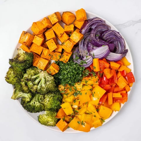 Vibrant Friendsgiving Rainbow Roasted Vegetable Medley with tender-crisp textures and fragrant herbs.
