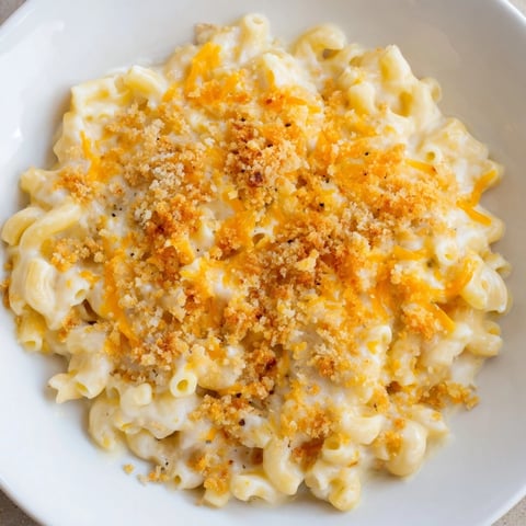 Golden, bubbly Mac & Cheese with Evaporated Milk, perfect for a comforting family dinner.