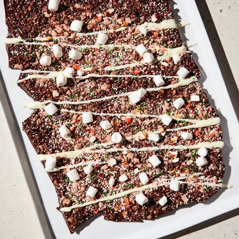 Sweet, decadent Hot Chocolate Bomb Bark, a festive dessert recipe perfect for sharing.