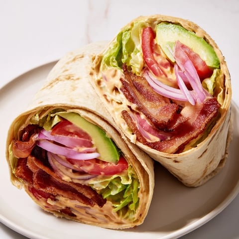 Zesty BLT Wraps with chipotle mayo: a delicious wrap featuring crispy bacon, fresh veggies, and smoky mayo.