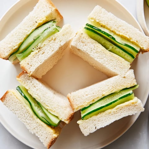 Castle Feast Royal Tea Party Sandwiches arranged on a tiered platter, ready for a delightful afternoon tea party.
