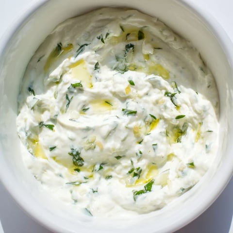Creamy Green Goddess Salad Dip, a vibrant appetizer, ready to serve with crispy tortilla chips.