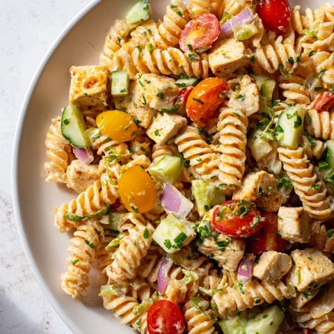 Honey Mustard Chicken Pasta Salad with vibrant colors, a perfect picnic dish.
