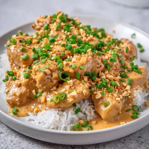 A plate of food with rice and meat.