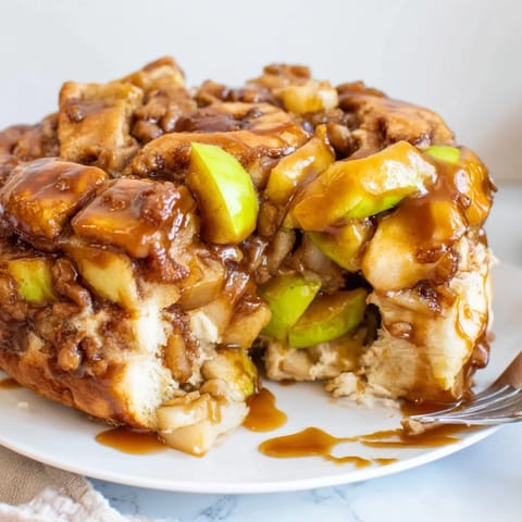 Flavorful cinnamon rolls topped with tender apples make a perfect brunch dish.  