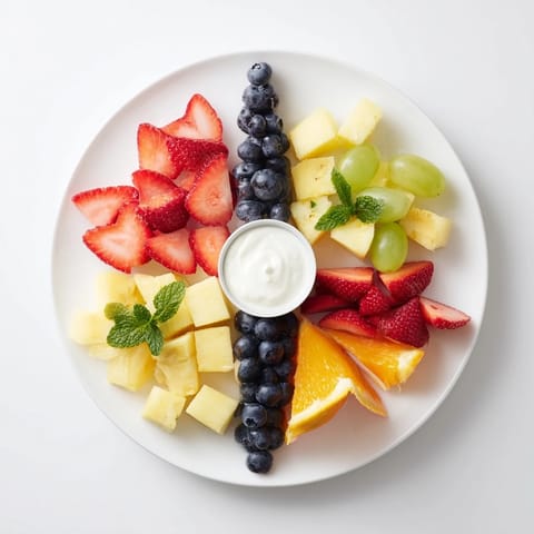 Beach Ball Fruit Platter bursting with colorful fruit segments, a refreshing and delicious summer snack.