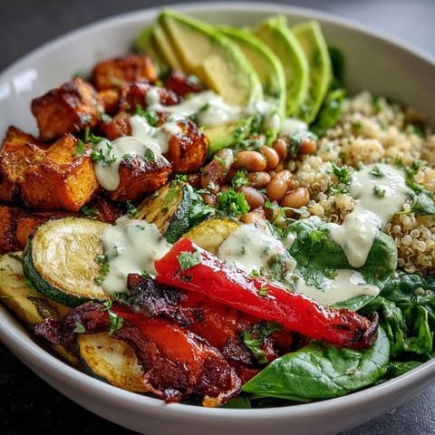 Healthy Black-Eyed Pea Buddha Bowl featuring warm spiced black-eyed peas, crisp spinach, and caramelized sweet potatoes for a wholesome, fiber-rich meal.