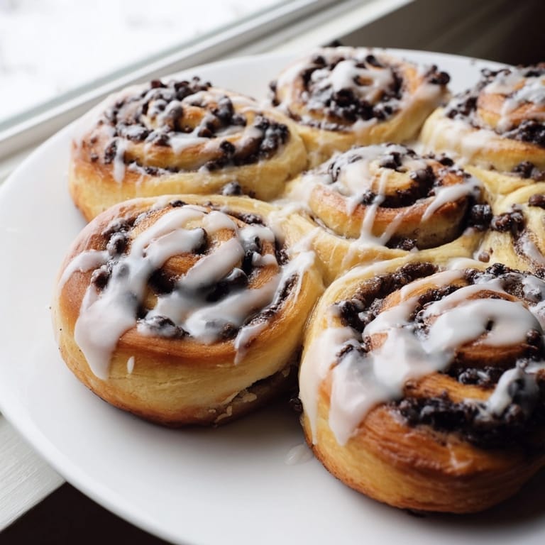 Sliced Protein Cookie Dough Sweet Rolls showing the cookie dough swirl, inviting and delicious.