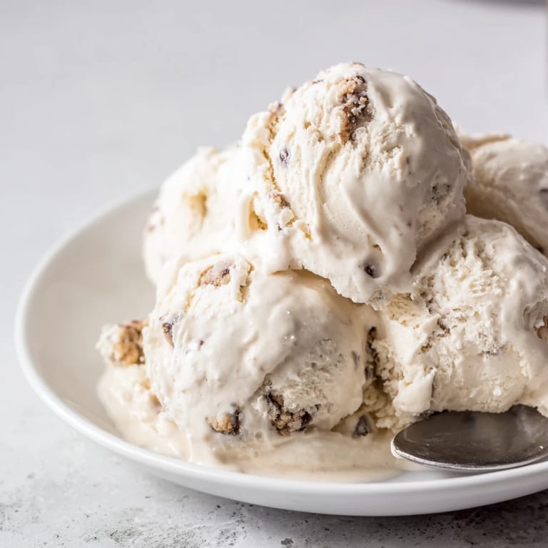 Homemade cottage cheese ice cream with chocolate chip cookie dough for a refreshing dessert.