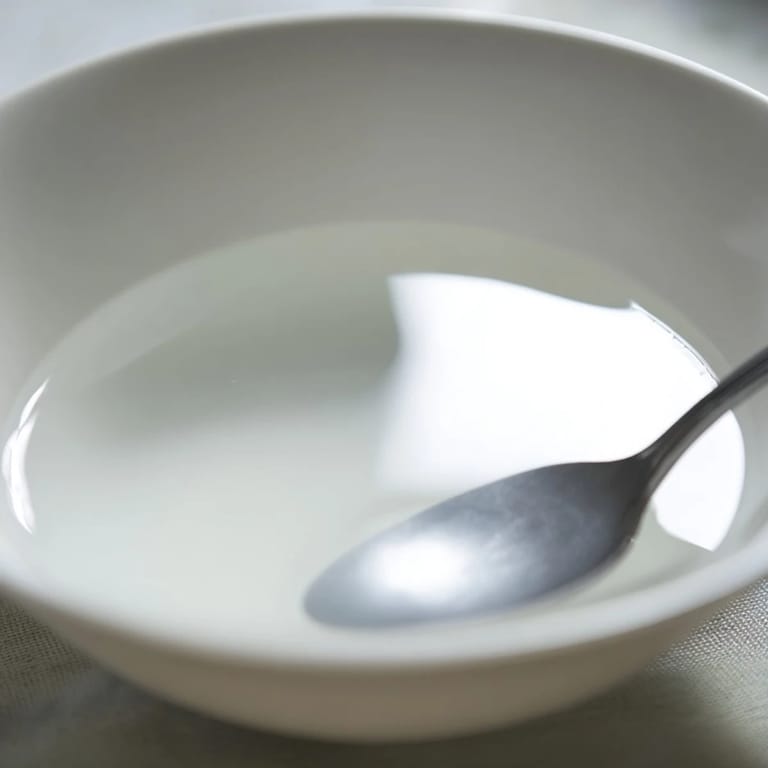 Crystal-clear water beautifully garnished with citrus and herbs for hydration.  