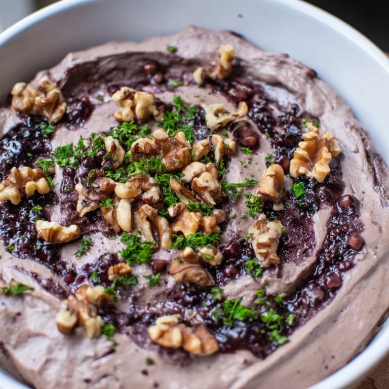 A close-up view shows a delectable The Velvet Underground with rich, creamy pâté and vibrant jam swirls.