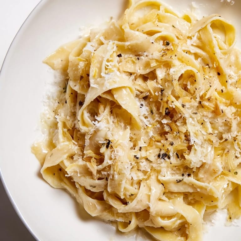 This Roasted Garlic Cream Pasta features perfectly cooked pasta coated in a rich, flavorful sauce.